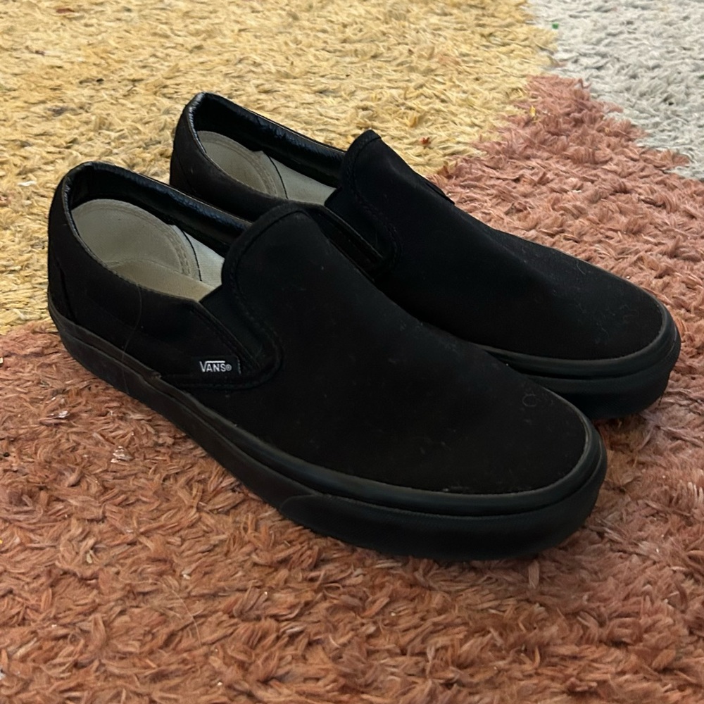 All black slip on Vans size Men’s 8